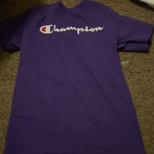 A purple champion shirt
